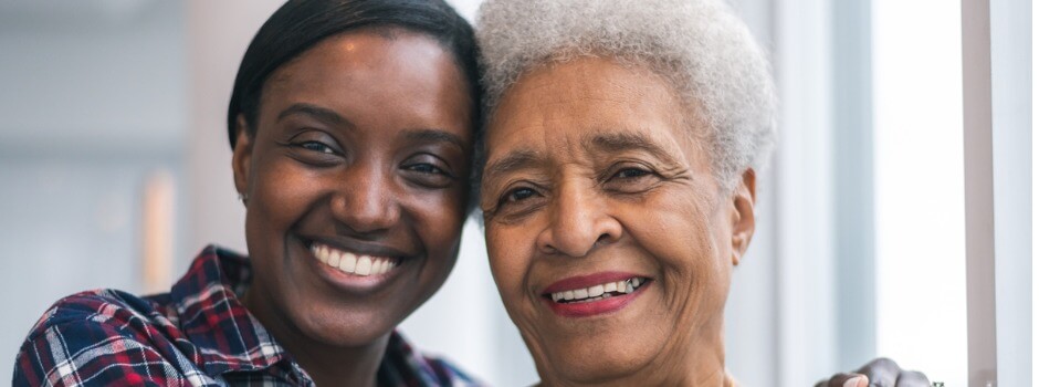 An adult daughter with her mother. 