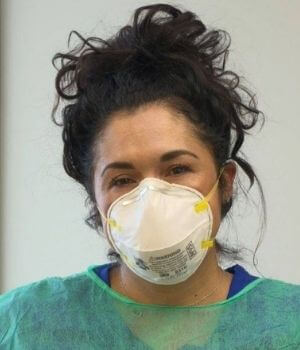 InnovAge Nurse Wearing PPE