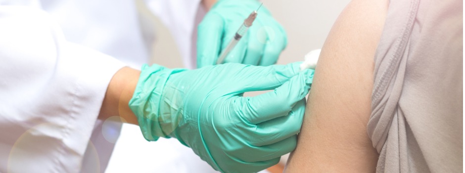Healthcare Professional Administering Vaccine